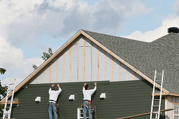Professional Siding technician working in Greenville, OH
